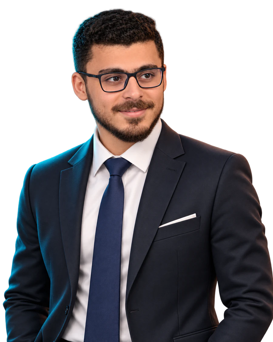 Mahmoud Karzoun in a navy suit and tie